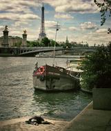 famous France Eiffel Tower and river boat