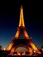 tower in paris in colorful night lighting