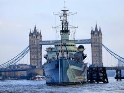 Tower Bridge and boat and Thames river