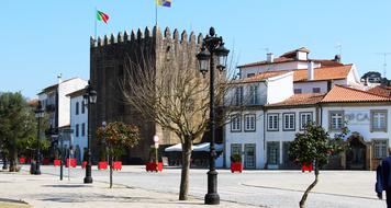 fortress with flags on city street