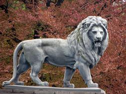 Lion Animal sculpture at Tree