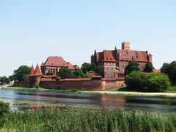 Castle Building and river and grass