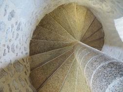 staircase of a medieval castle in france