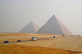 Pyramids Egypt Sand and cars