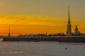 yellow sky over winter saint petersburg