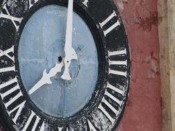 Clock Face Old on the facade close-up