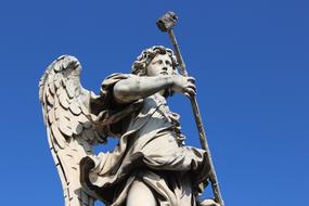 Angel Roma statue blue sky