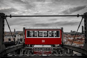 Red and white landmark, among the beautiful Vienna, under the cloudy sky, in Austria