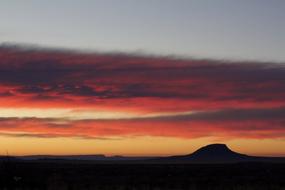 colorful sunset in the clouds over the landscapes of new mexico