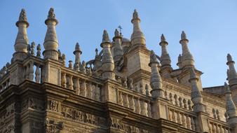 historic building with pillars against the blue sky