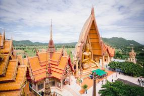 golden temple with Buddha in Thailand