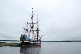 Ship Historical Sea near the coast on a cloudy day