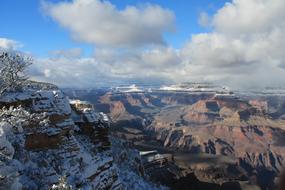 Beautiful landscape of the colorful Grand Canyon, in winter, under the blue sky with clouds, in Arizona, USA