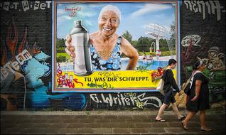 woman on colorful graffiti in berlin