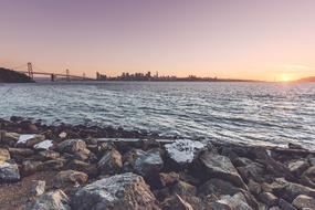 distant view from the beach to the bridge in san francisco