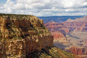 Beautiful landscape of the colorful Grand Canyon National Park, in Arizona, USA, under the blue sky with clouds