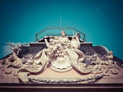 sculpture on the roof of the castle