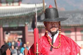 man in a suit in korea on a blurred background