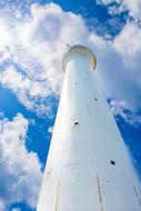 Lighthouse at Summer blue white sky