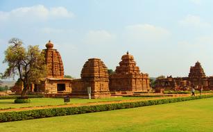 Beautiful Pattadakal monuments among the colorful fields in Karnataka, India