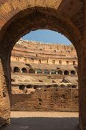 arch of the ancient colosseum in rome