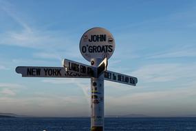 john o'groats signpost blue sky