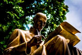 copper sculpture of the writer in the park