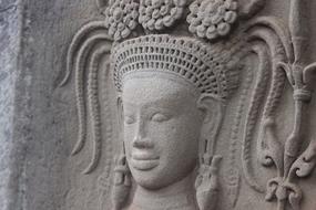 Beautiful sculpture of the person with headdress