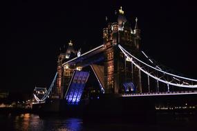 lights Tower Bridge and Thames River