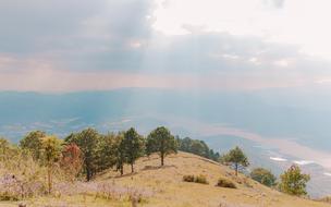 haze over scenic landscape on cloudy day