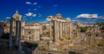 Beautiful Campidoglio with green trees, at blue sky with white clouds on background, in Rome, Italy