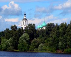 Beautiful Volga river with green trees and beautiful Tolga monastery in Yaroslavl, Russia