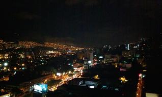 Beautiful cityscape of Medellin, with the colorful lights, in Colombia, at the night