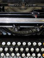 Close-up of the beautiful, retro typewriter with white and black keys