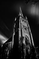 church tower with spire in black and white background