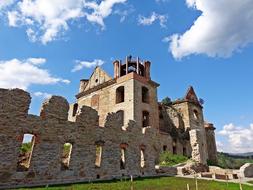 ruins of an ancient stone castle on a sunny day