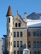 Beautiful medieval building in light and shadow, under the blue sky