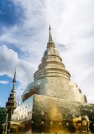 golden tower of the Temple of the Emerald Buddha, Thailand