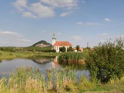 Historic Church Architecture near pond