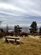 wooden bench on the highlands in scotland