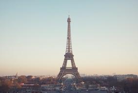 eiffel tower over city at morning, france, paris