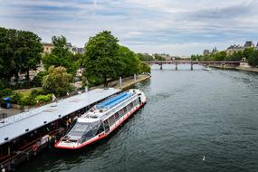 tourist boat on Seine River, France, Paris