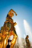 golden statue in the fountain in Peterhof, St. Petersburg