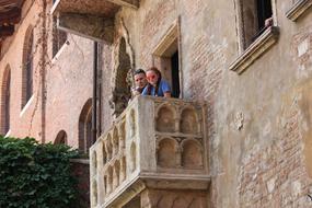 People on Balcony Rodinka