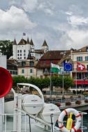 Beautiful and colorful castle in Nyon, Switzerland, under the clouds