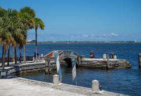 Colorful dock of VIzcaya in Miami, Florida, USA, with palm trees