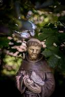 st francis of assisi, Monk with dove, stone sculpture in Garden