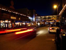 cars on the road at night in california