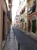 narrow street of the old town in lisbon