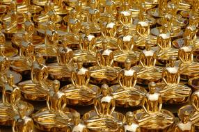 Shiny, gold Buddha statues in the Dhammakaya Pagoda in Thailand